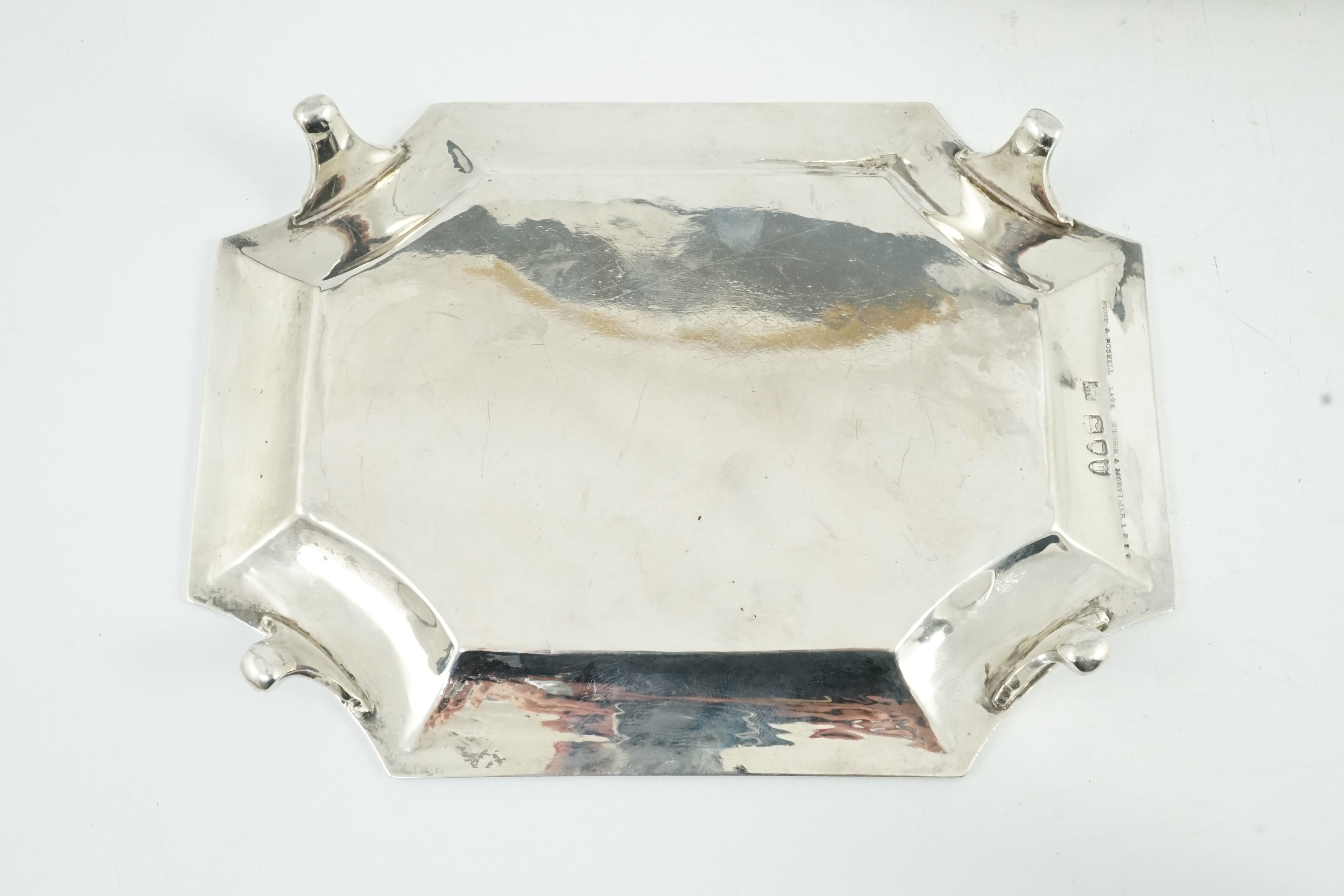 A pair of late Victorian engraved silver teapot stands, by Hunt & Roskell (ex Storr & Mortimer)